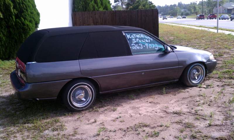 Illustration for article titled For $2,300, this custom Escort lowrider hearse lets you go in style
